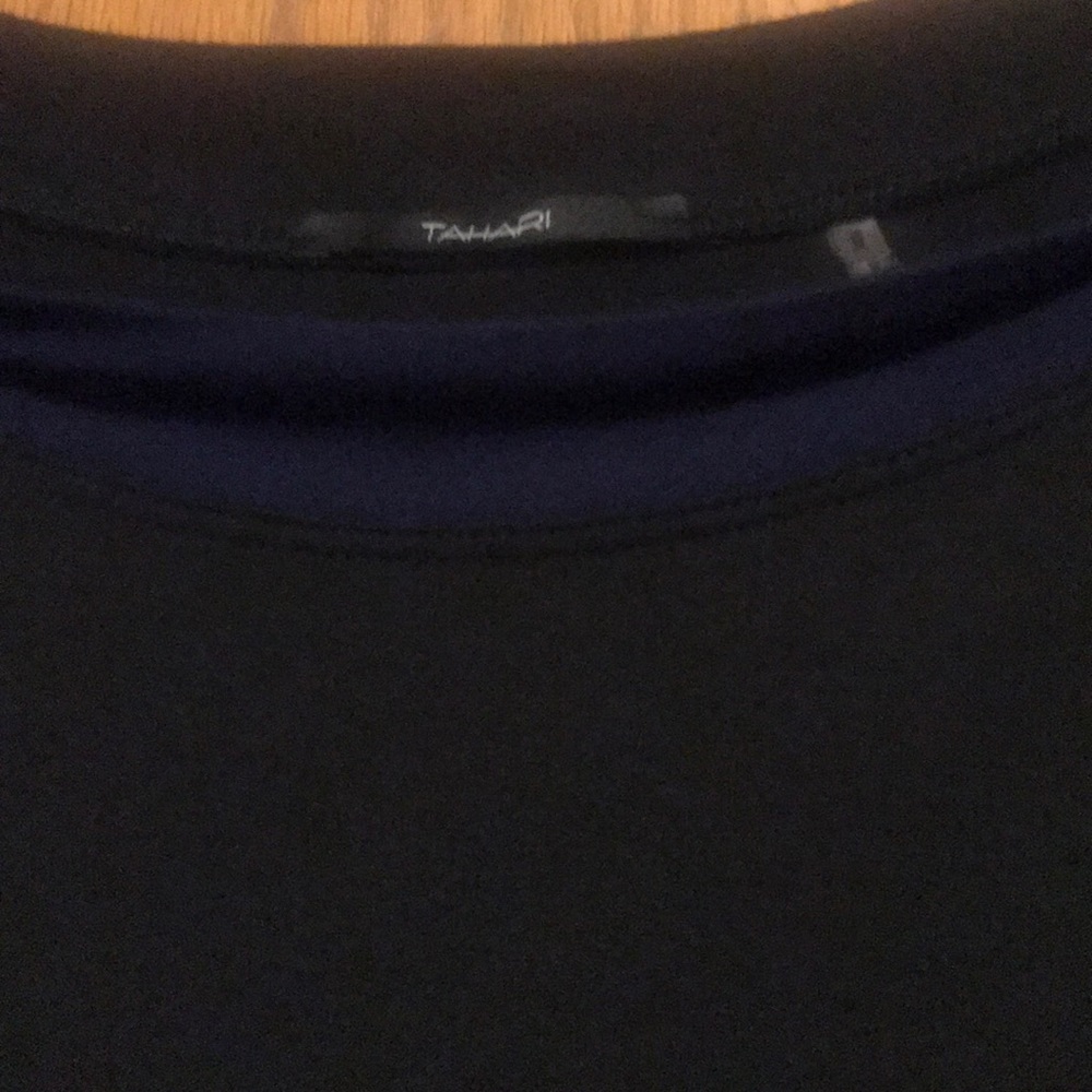 Black Tahari top with navy trim at the neck